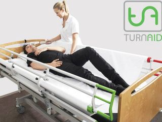 อุปกรณ์พลิกตัวผู้ป่วยติดเตียงลดแผลกดทับ ยี่ห้อ TURNAID