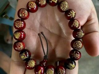 กำไลลงยันต์