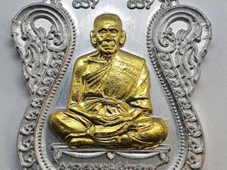 เหรียญเลื่อน หลวงพ่อพัฒน์ เนื้อปีกเครื่องบินหน้ากากทอง